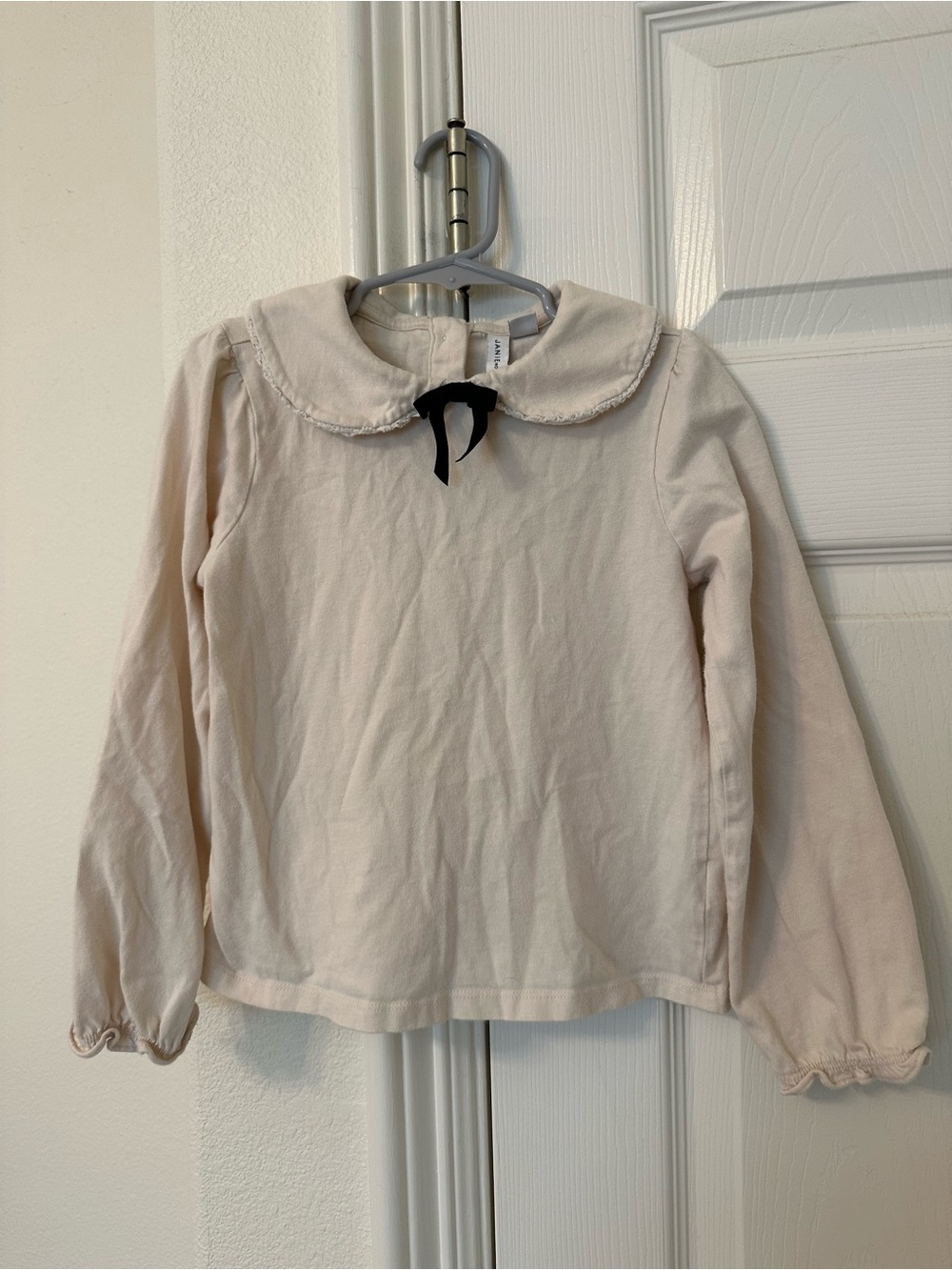 Janie and Jack Cream Long-Sleeve Top with Peter Pan Collar and Black Bow